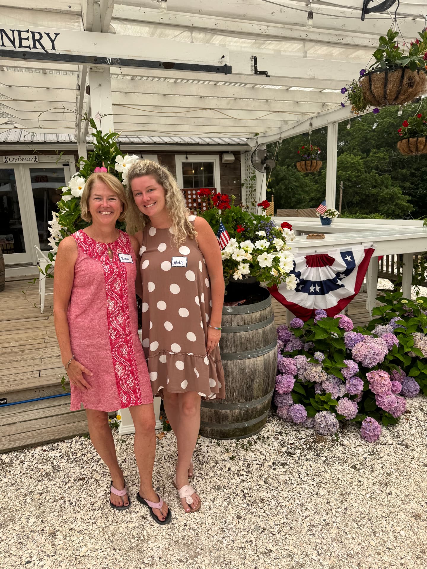 Sue and her daughter Abby smiling at an Open Play event at Cape Cod Winery in Falmouth